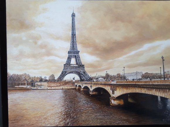 le petit bonhomme en rouge et la tour eiffel